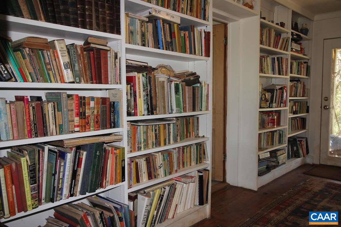 7814 Chestnut Grove Road Esmont, VA 22937 - Photo 6 of 28 a view of an empty with a book shelf