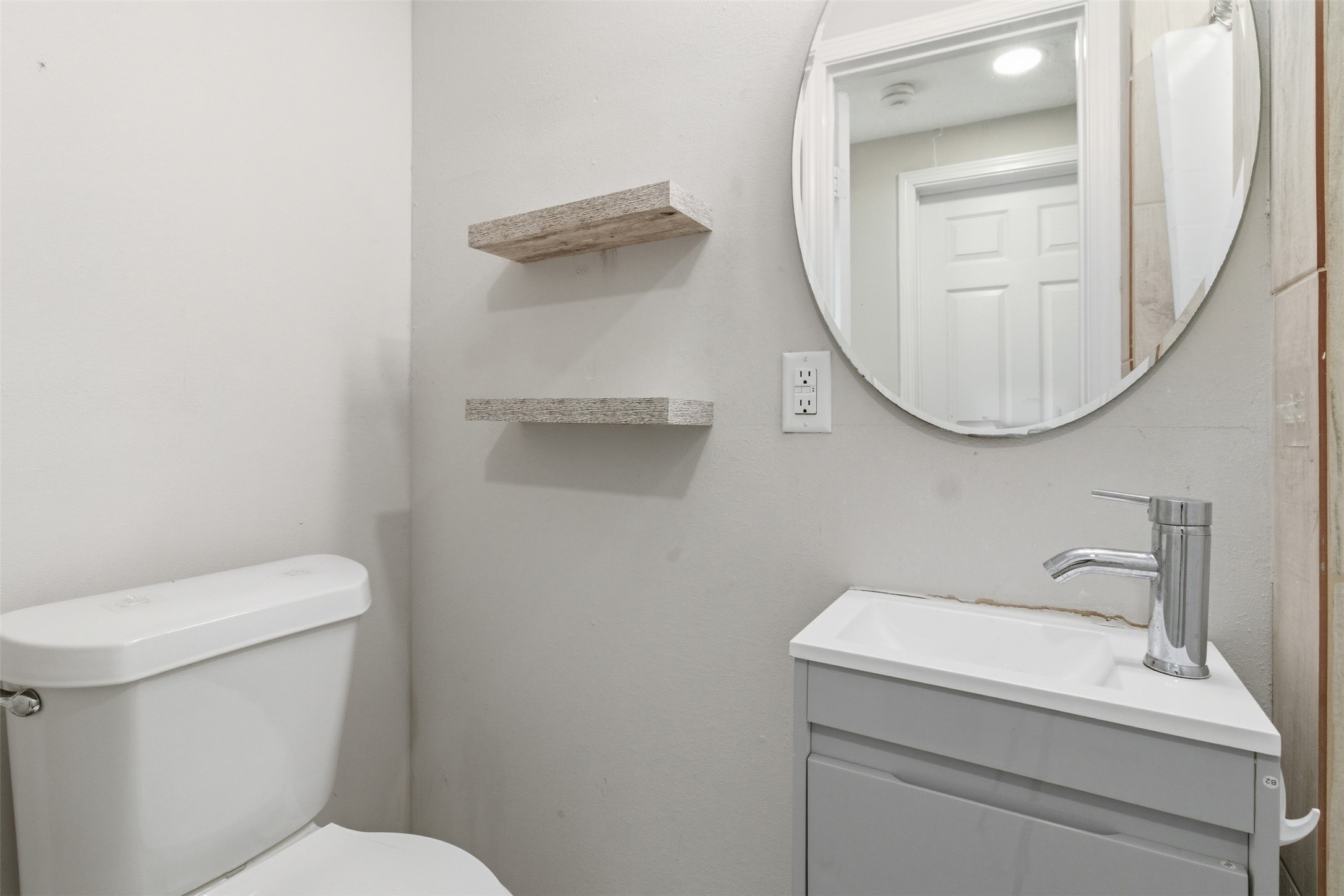 306 Center Street Pasadena, TX 77506 - Photo 20 of 31 a bathroom with a toilet and a sink