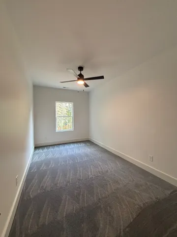 an empty room that has a window