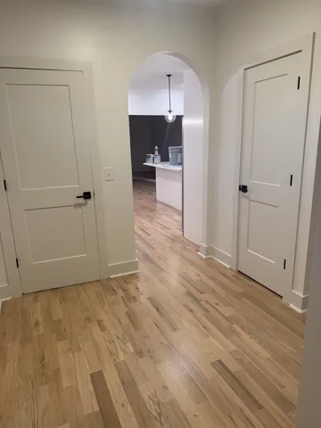 a view of a livingroom with wooden floor
