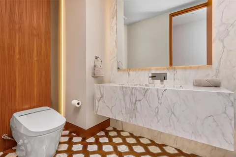 a living room with furniture and a gate