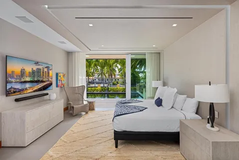 a bedroom with furniture and a bed