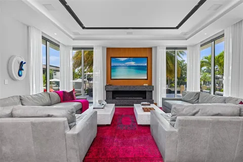 a spacious bedroom with a bed and a fireplace