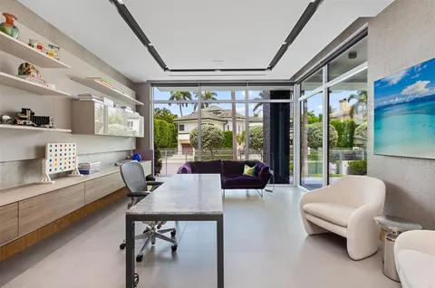 a spacious bedroom with a bed and a couch