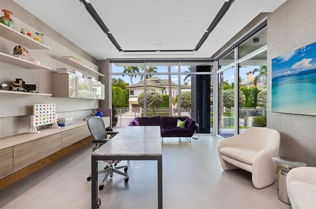 a spacious bedroom with a bed and a couch