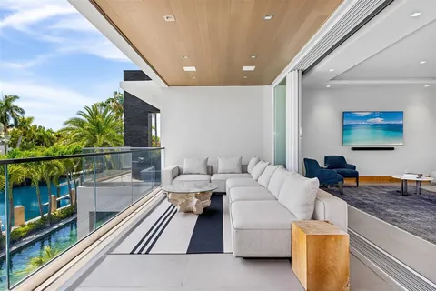 a view of a patio with couches chairs dining table and chairs