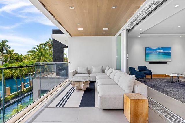 a view of a patio with couches chairs dining table and chairs