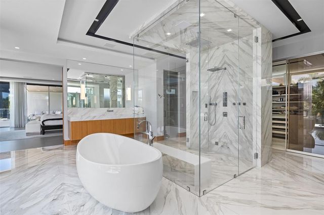 a view of a chairs and table in patio