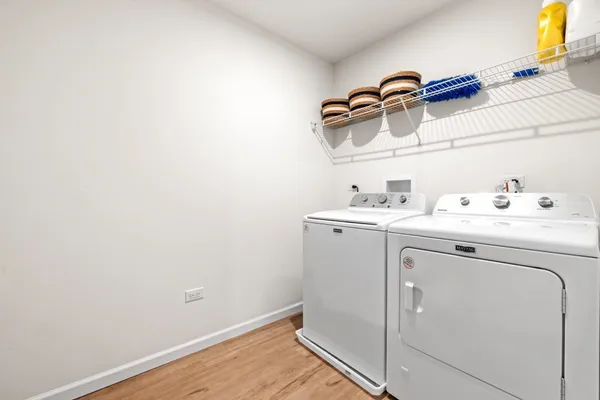 a utility room with dryer and washer