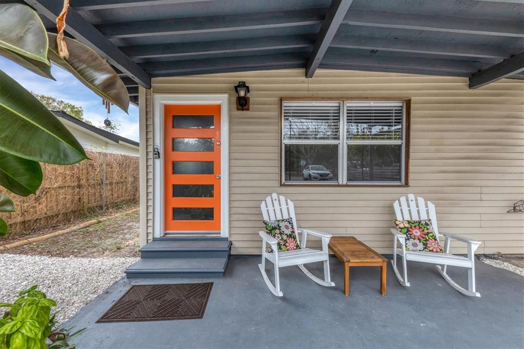 2305 Novus Street Sarasota, FL 34237 - Photo 4 of 28 a front view of a house with outdoor seating