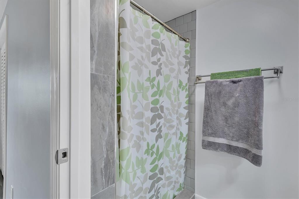 2305 Novus Street Sarasota, FL 34237 - Photo 8 of 28 a bathroom with a shower