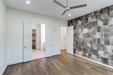 a view of a bathroom with a shower and a sink
