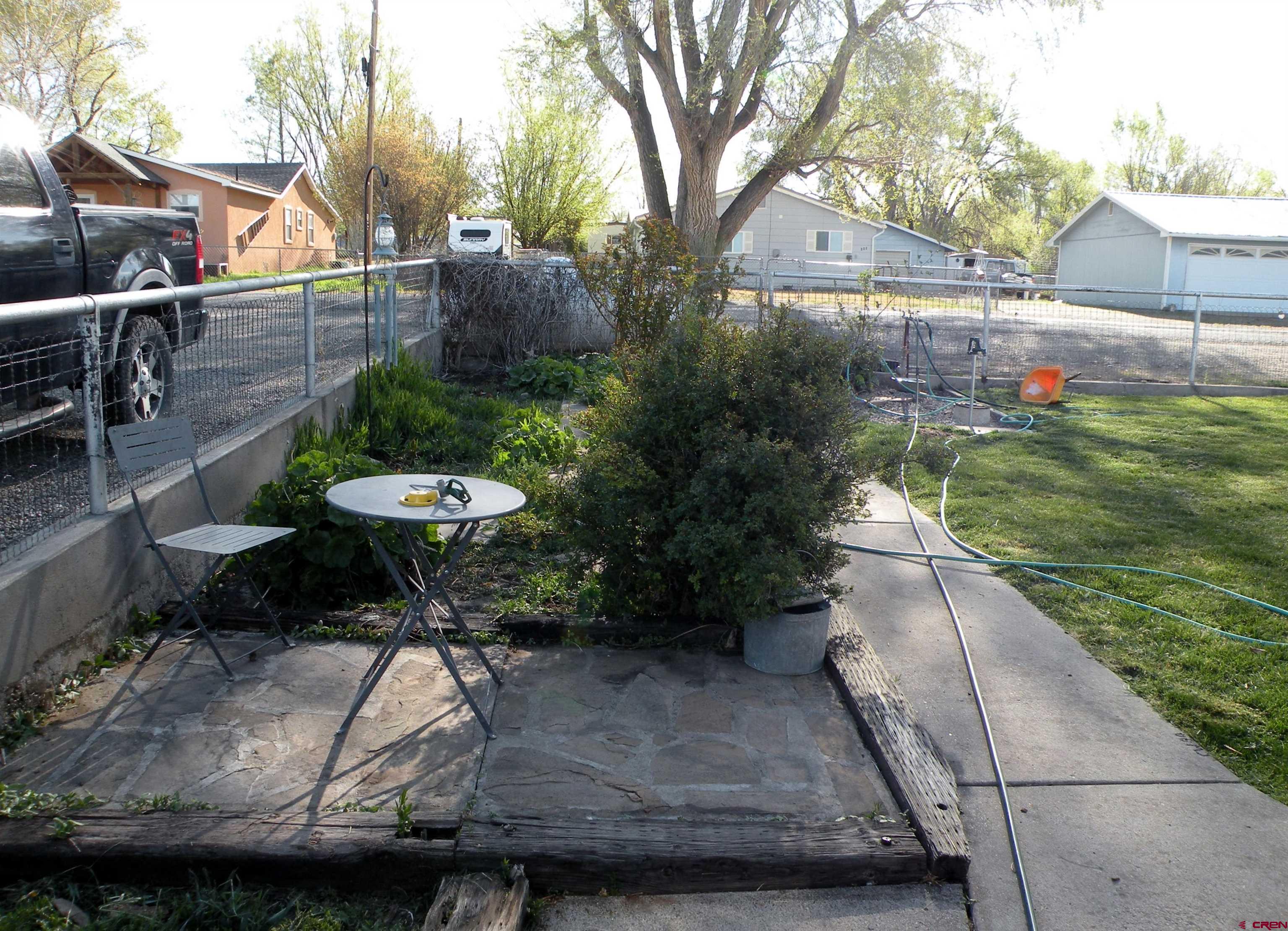 810 Grape Street Nucla, CO 81424 - Photo 12 of 31 a view of a backyard with sitting area