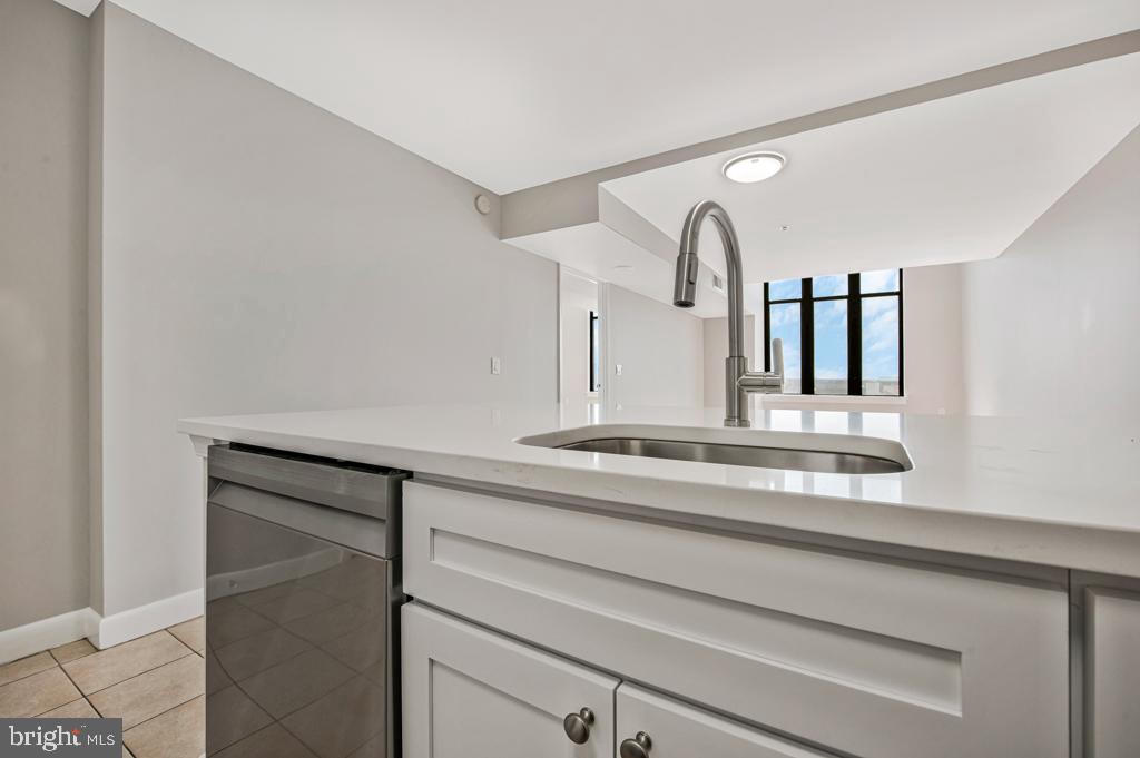 400 Massachusetts Avenue Northwest, Unit 1322 Washington, DC 20001 - Photo 13 of 37 a close view of sink and tap