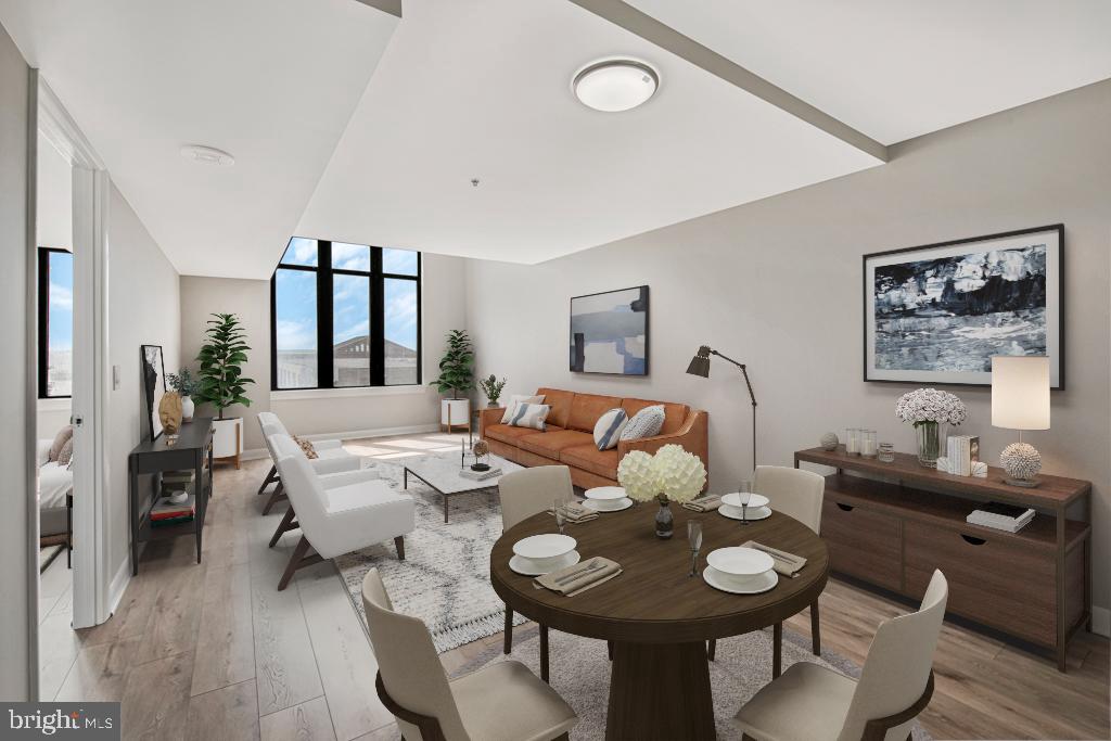 400 Massachusetts Avenue Northwest, Unit 1322 Washington, DC 20001 - Photo 28 of 37 a living room with furniture and wooden floor