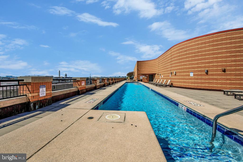 400 Massachusetts Avenue Northwest, Unit 1322 Washington, DC 20001 - Photo 34 of 37 a view of a balcony with ocean view