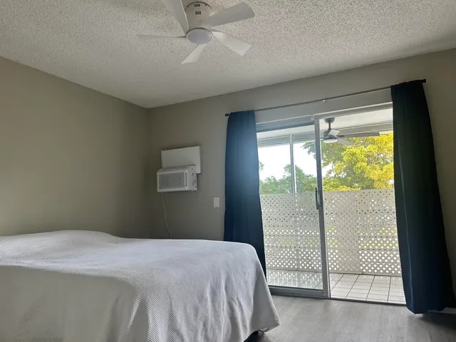 a view of a swimming pool with a yard