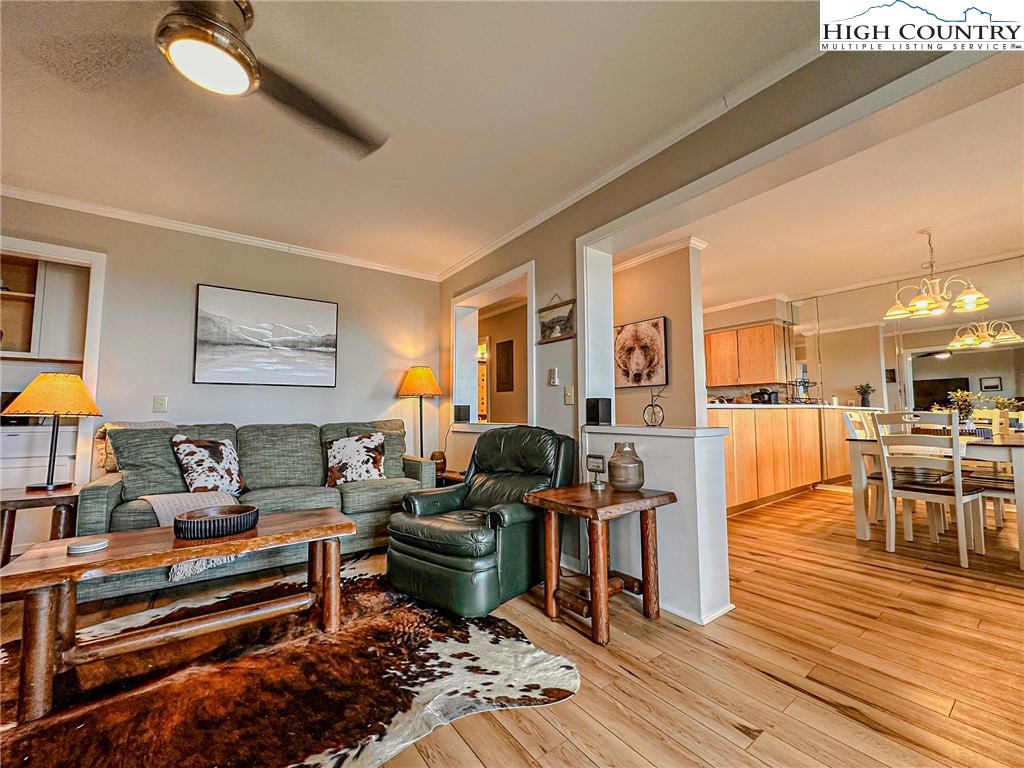 301 Pinnacle Inn Road, Unit 3320 Beech Mountain, NC 28604 - Photo 17 of 45 a living room with furniture and wooden floor