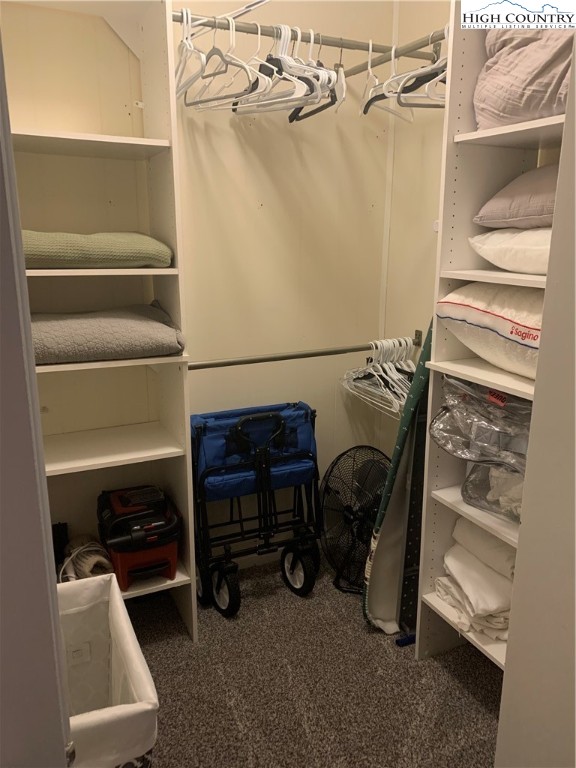 301 Pinnacle Inn Road, Unit 3320 Beech Mountain, NC 28604 - Photo 23 of 45 a view of walk in closet with clothes and shoes