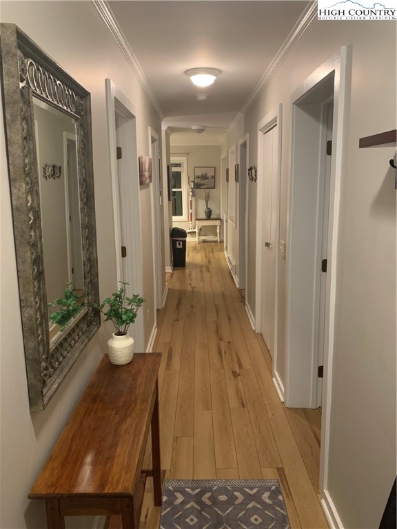 301 Pinnacle Inn Road, Unit 3320 Beech Mountain, NC 28604 - Photo 26 of 45 a view of a hallway with wooden floor and furniture