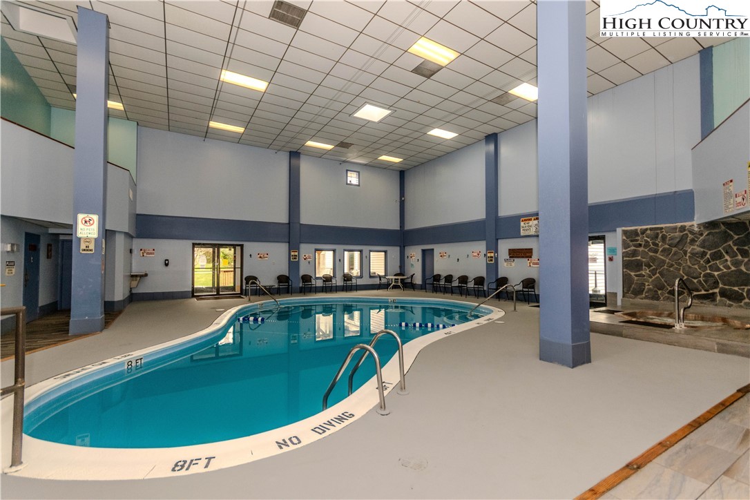 301 Pinnacle Inn Road, Unit 3320 Beech Mountain, NC 28604 - Photo 35 of 45 a view of a swimming pool with a kitchen