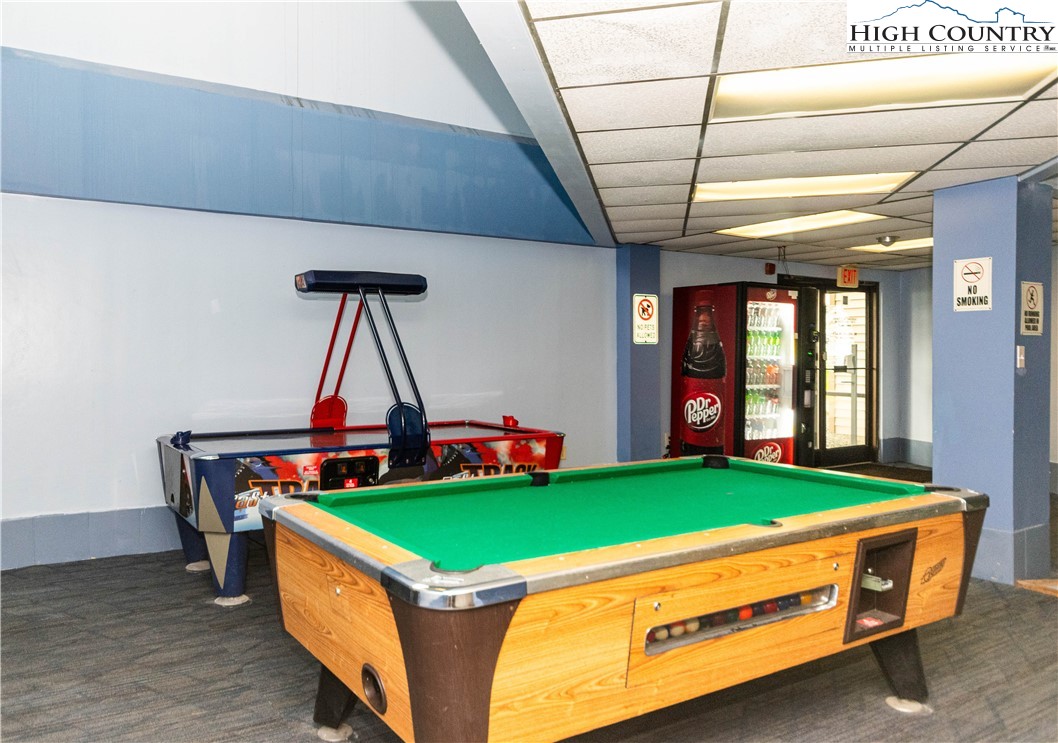 301 Pinnacle Inn Road, Unit 3320 Beech Mountain, NC 28604 - Photo 36 of 45 a room with pool table and windows