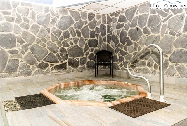 a view of swimming pool with a yard