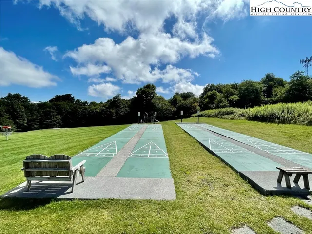 a view of a golf course with a park