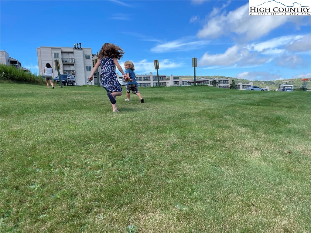 301 Pinnacle Inn Road, Unit 3320 Beech Mountain, NC 28604 - Photo 45 of 45 a view of a golf course with a yard