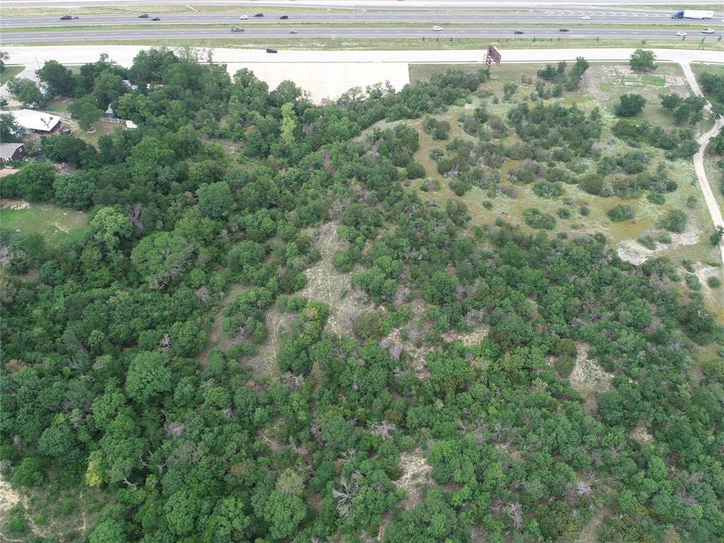 3104 East Interstate 20 Weatherford, TX 76087 - Photo 5 of 9 a view of a forest with a street