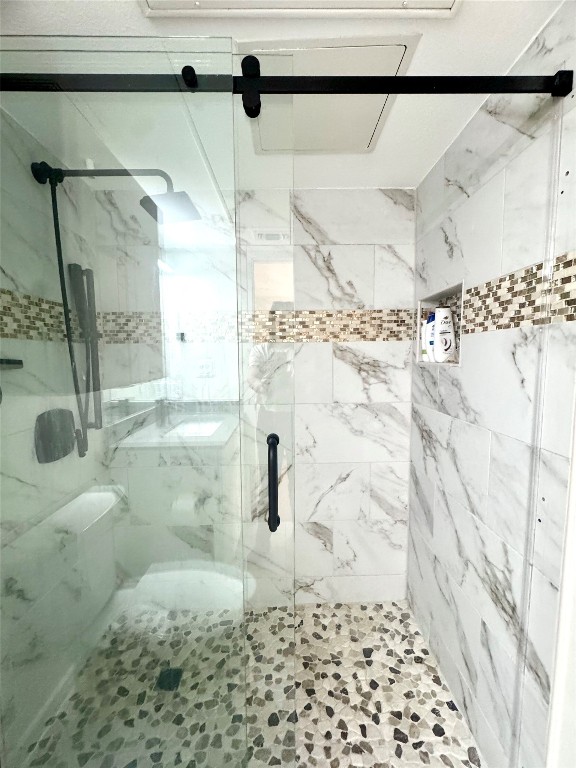 400 East 30th Street, Unit 101 Austin, TX 78705 - Photo 20 of 27 Bathroom with a marble finish shower