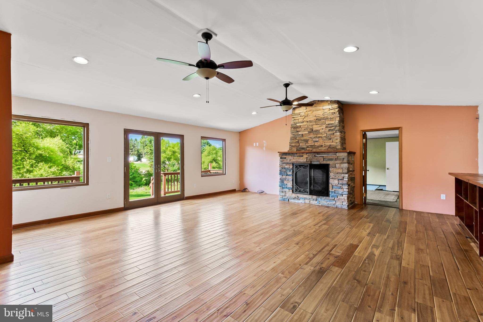 21532 West Liberty Road Parkton, MD 21120 - Photo 27 of 75 Oversized Great Room + ceiling fans + wood floors