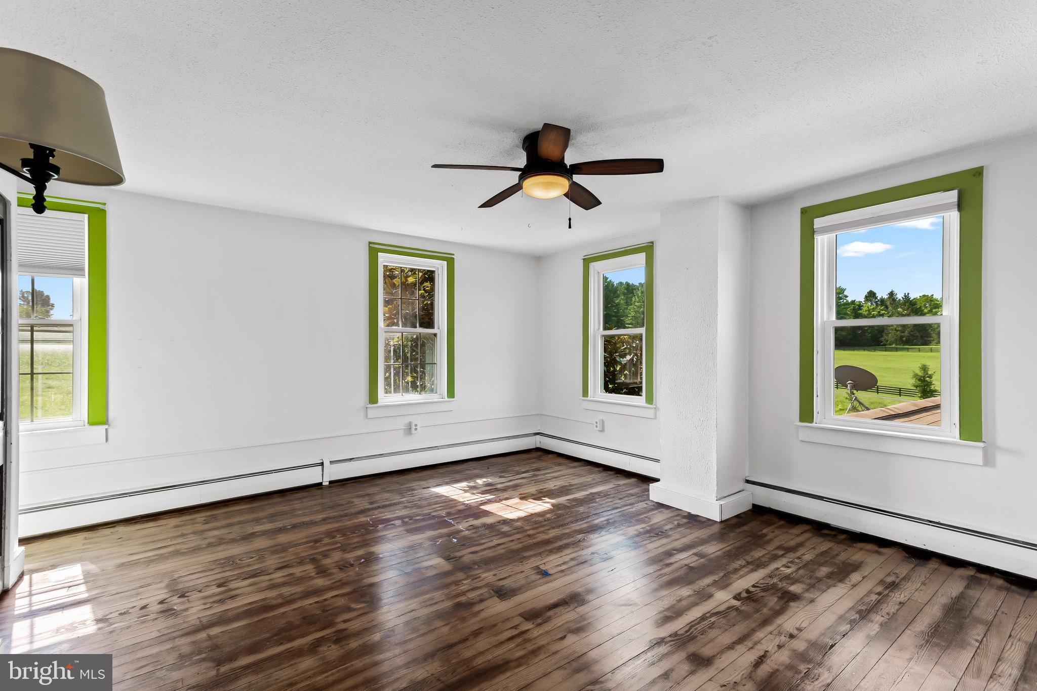21532 West Liberty Road Parkton, MD 21120 - Photo 37 of 75 Bedroom 1 with wood floors + lighted ceiling fan