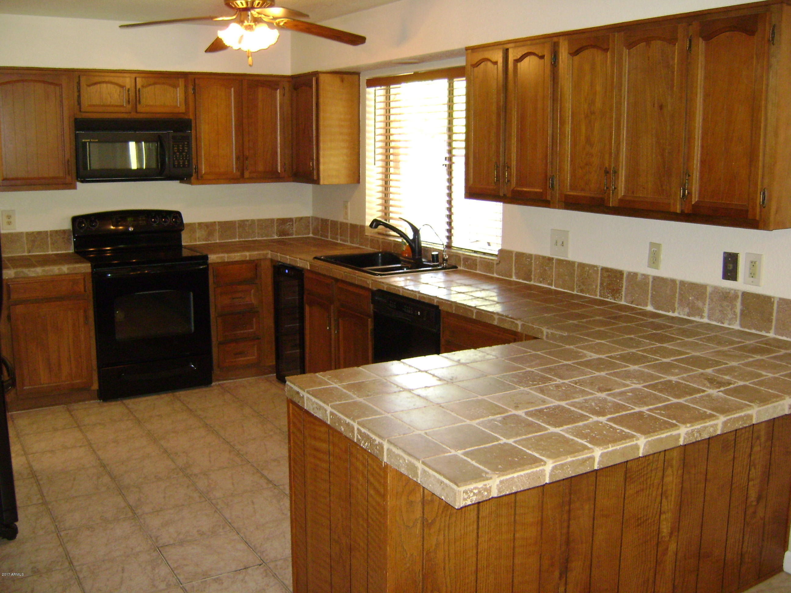 1707 East Redfield Road Tempe, AZ 85283 - Photo 12 of 19 Spacious Kitchen