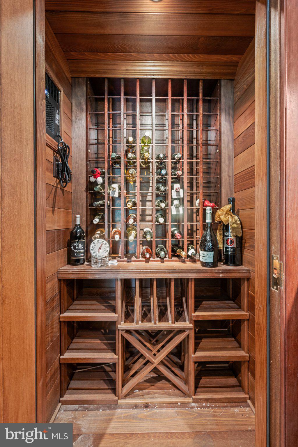 15 Paper Mill Road Newtown Square, PA 19073 - Photo 75 of 78 Elegant wine cellar with rich wood tones.