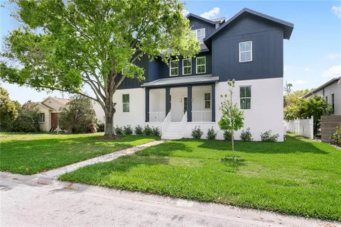 front view of a house with a yard