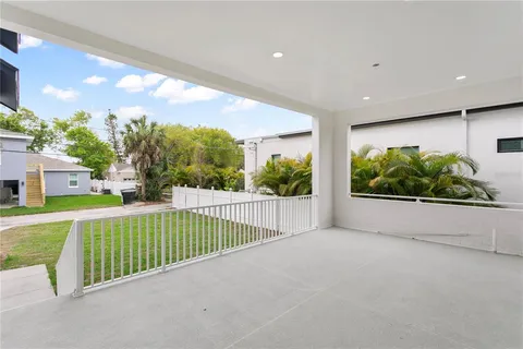 a bathroom with a sink a shower and a mirror