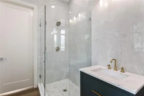 a white bath tub sitting next to a window