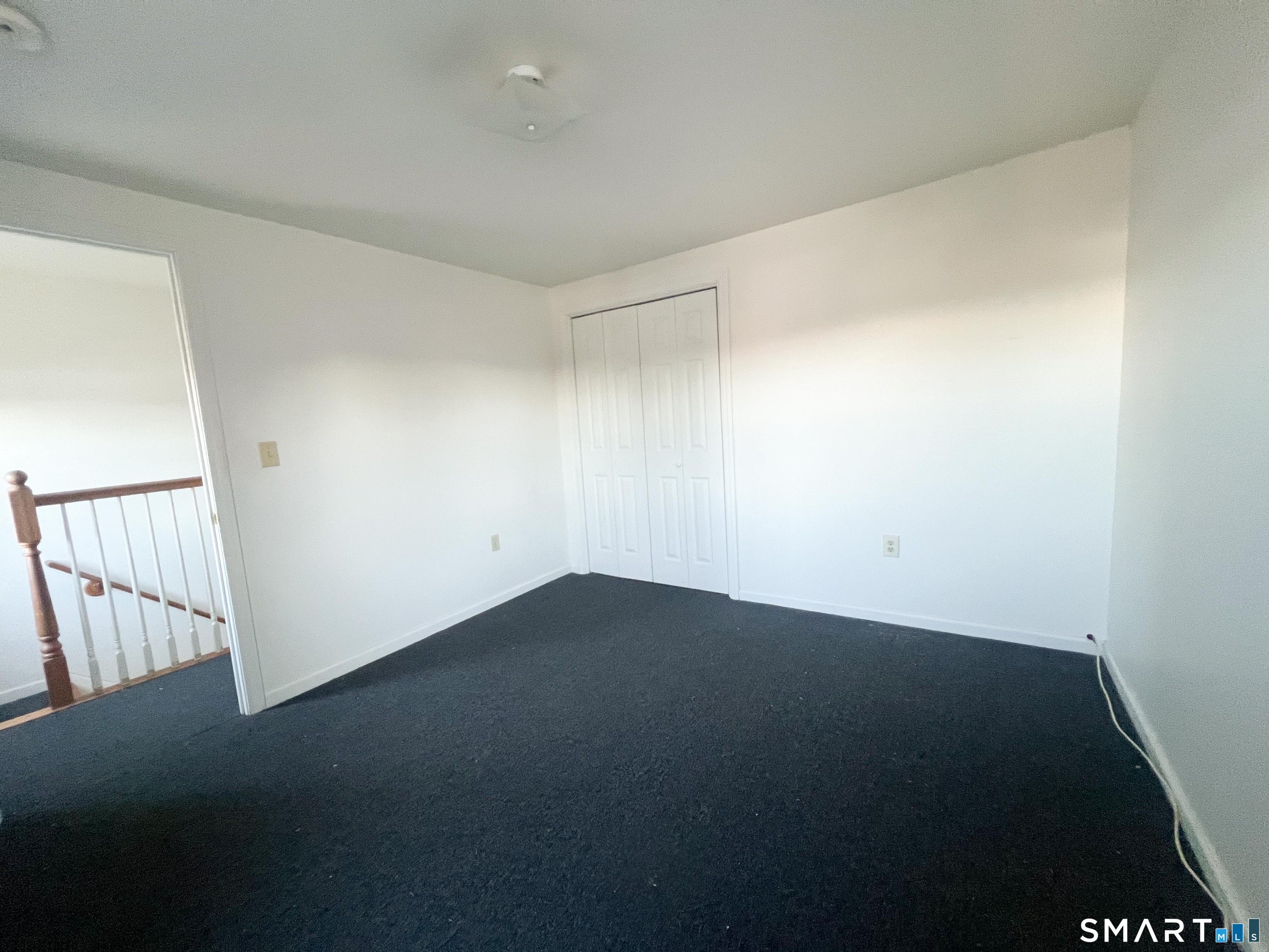 99 William Street, Unit B Bridgeport, CT 06608 - Photo 13 of 16 an empty room with a window