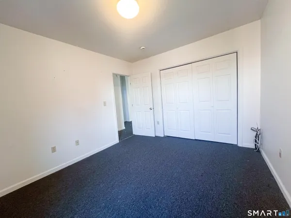 an empty room with closet