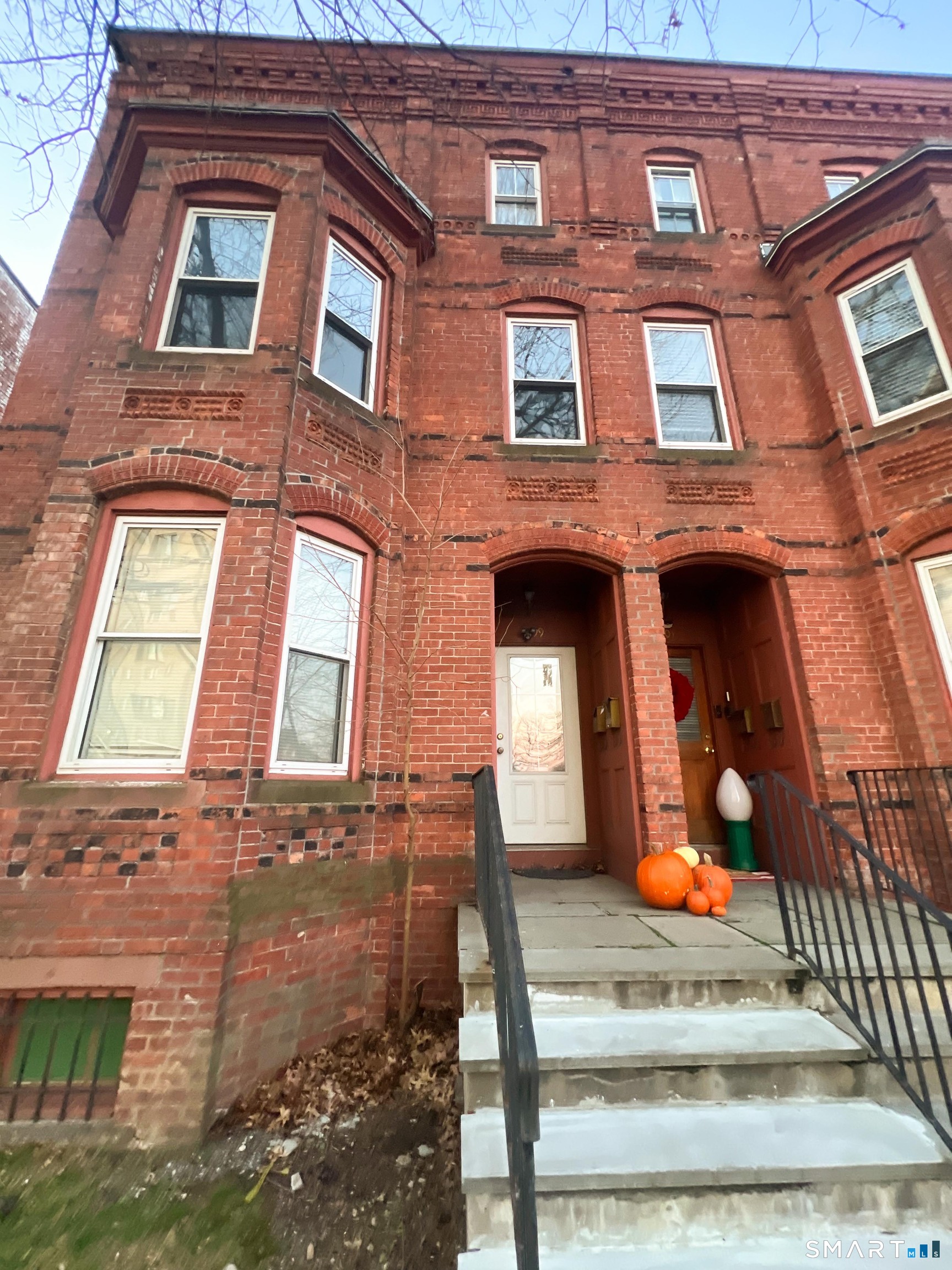 99 William Street, Unit B Bridgeport, CT 06608 - Photo 7 of 16 front view of a brick house
