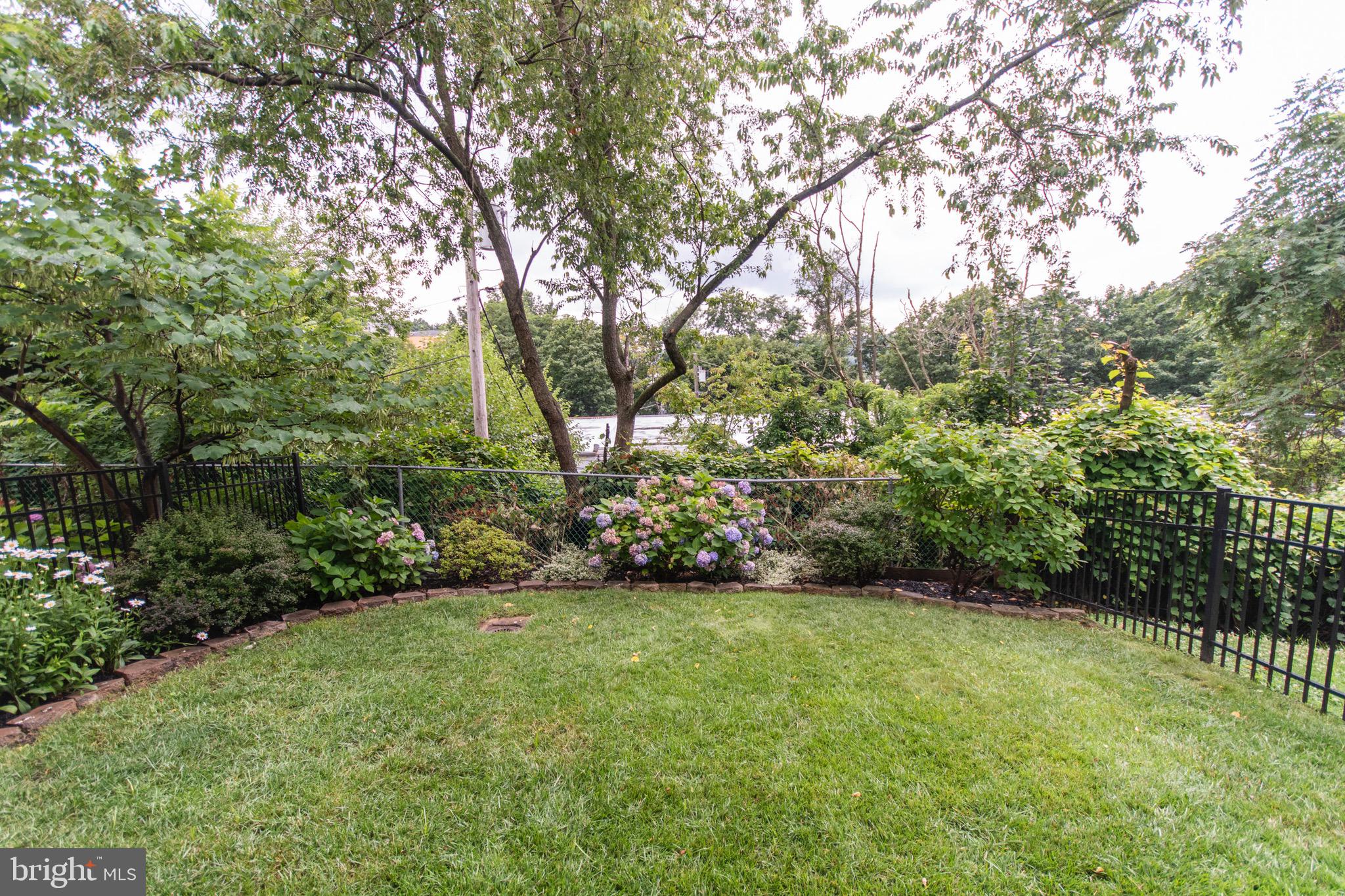 264 Ripka Street Philadelphia, PA 19127 - Photo 30 of 35 Beautifully Landscaped Fenced In Backyard