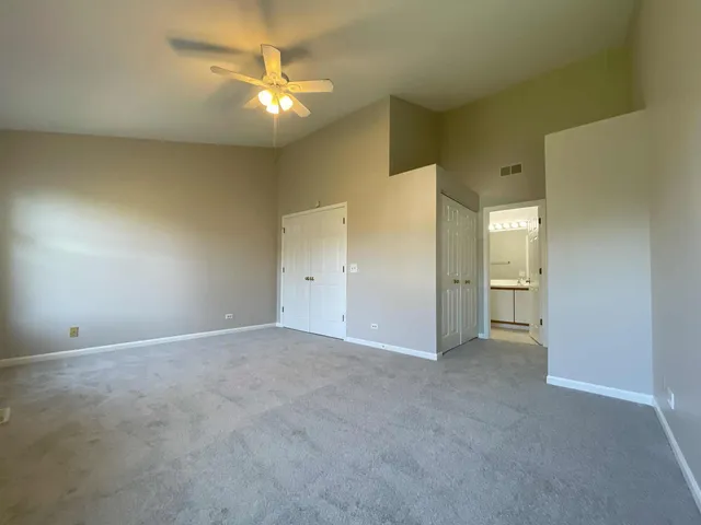 an empty room with a bathroom