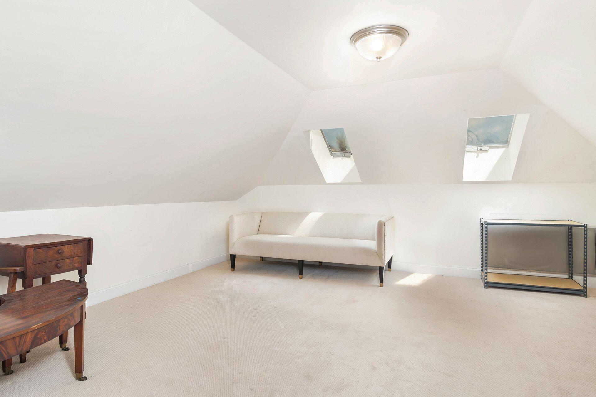 135 Root Trail, Unit A Palm Beach, FL 33480 - Photo 21 of 25 a living room with furniture and a window