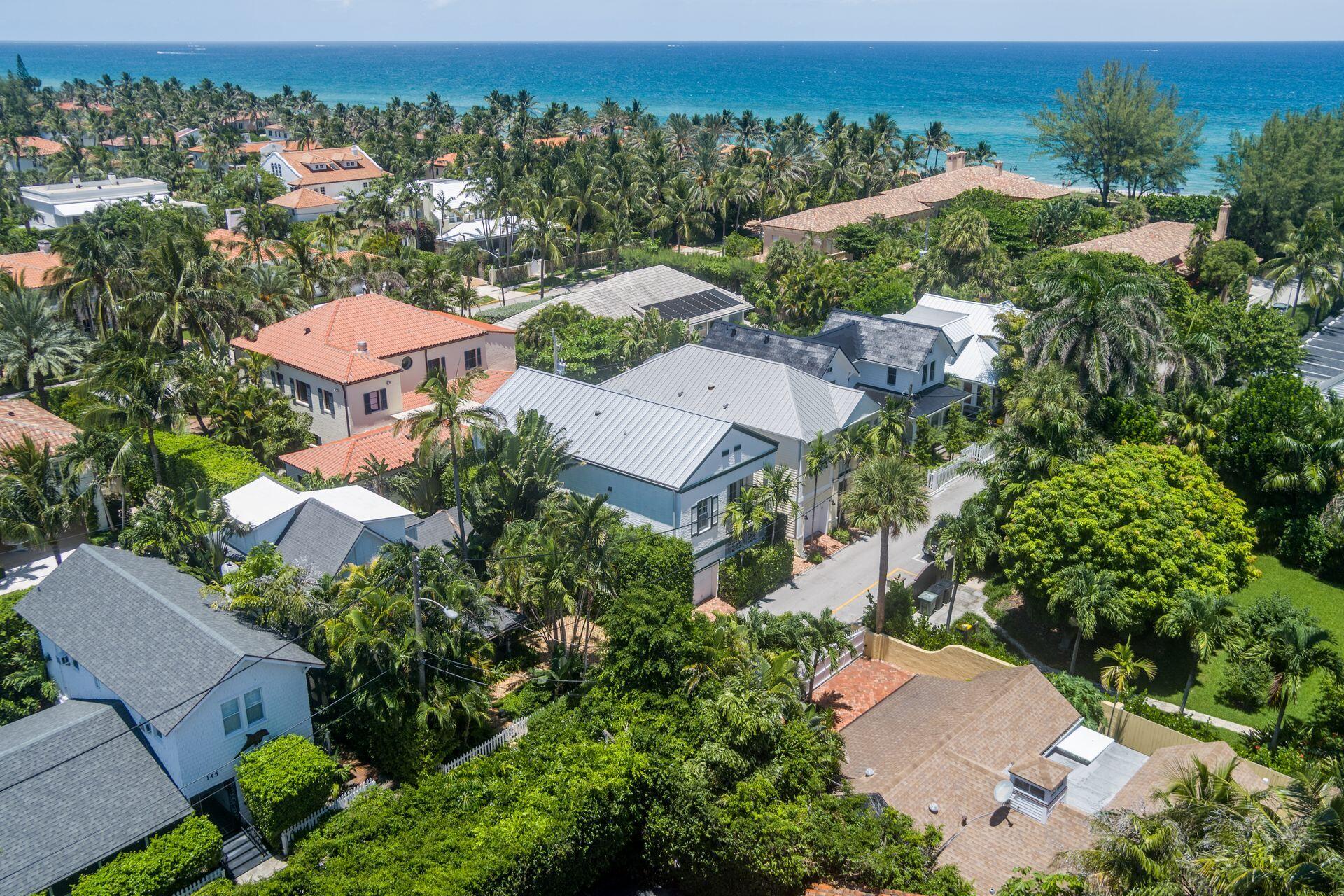 135 Root Trail, Unit A Palm Beach, FL 33480 - Photo 24 of 25 an aerial view of a houses with a yard