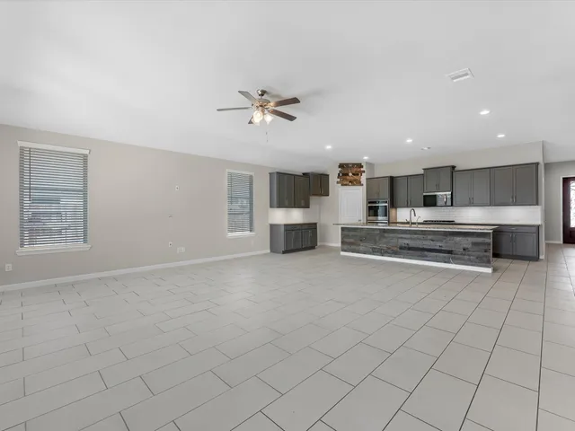 a view of kitchen with furniture and window