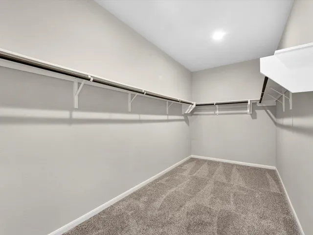 a view of a room with racks on the wall