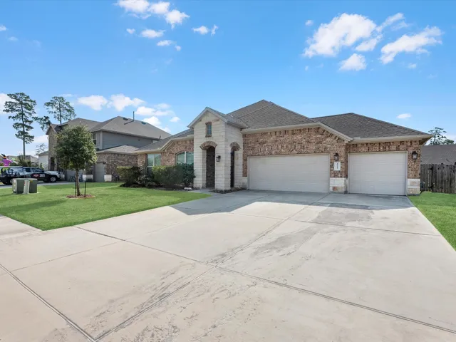 a house view with a garden space