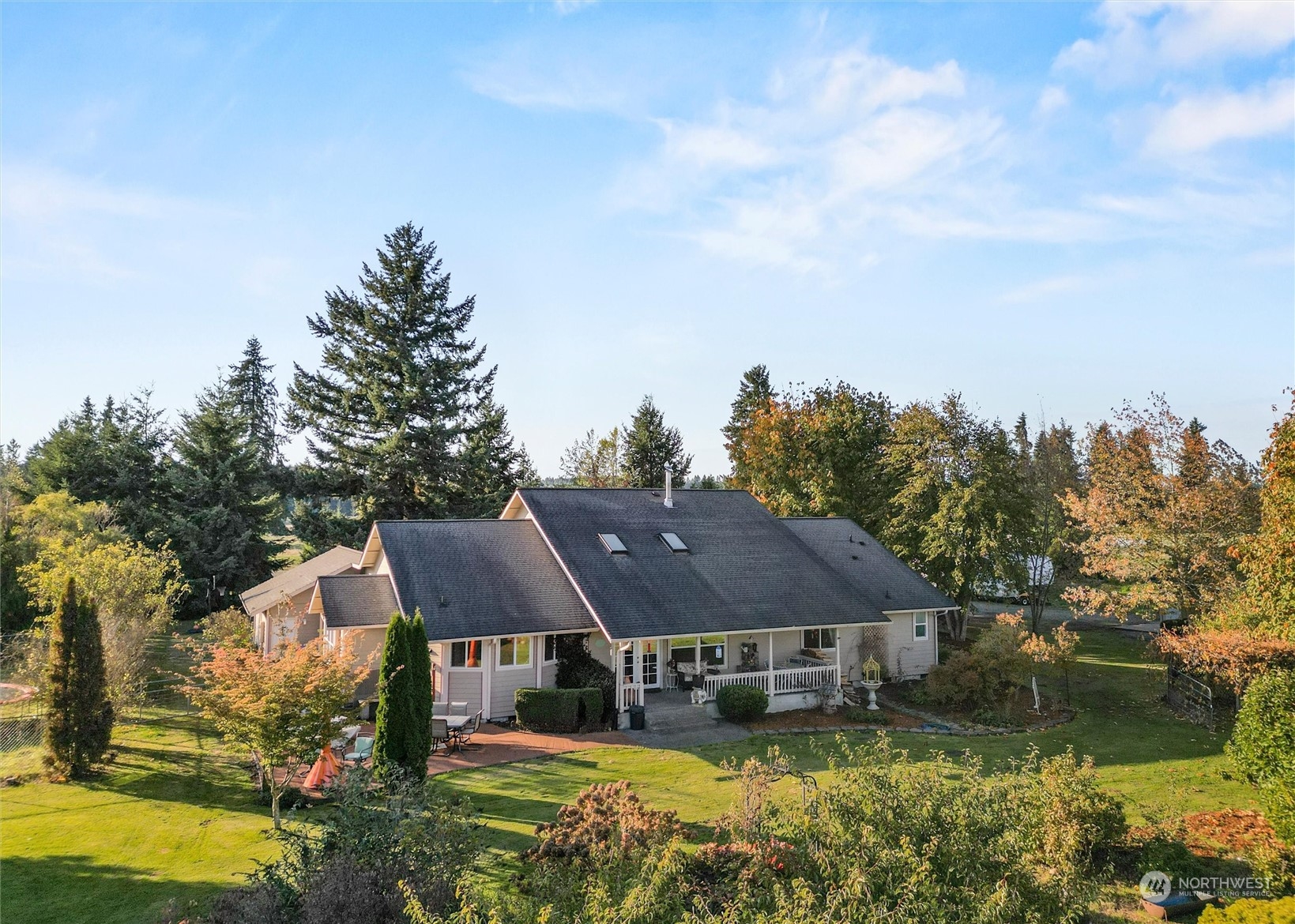17232 Kaylen Lane Southwest Rochester, WA 98579 - Photo 3 of 40 a aerial view of a house with swimming pool and a yard