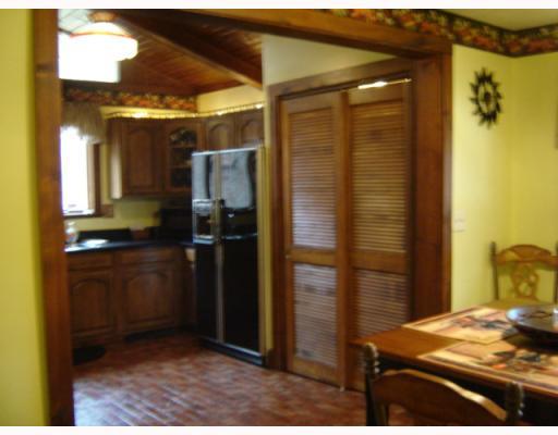 Kitchen. Italian flooring, crown molding, and an open layout make this kitchen a dream!
